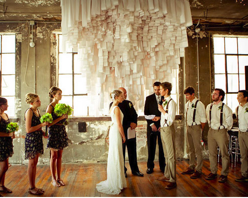 A few details I'm enjoying are their wedding backdrop made from receipt 